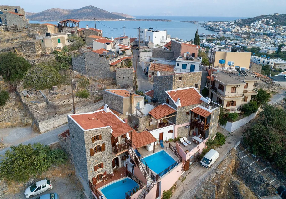 Aerial view of Mavrikiano on the hillside above Elounda and the coast.