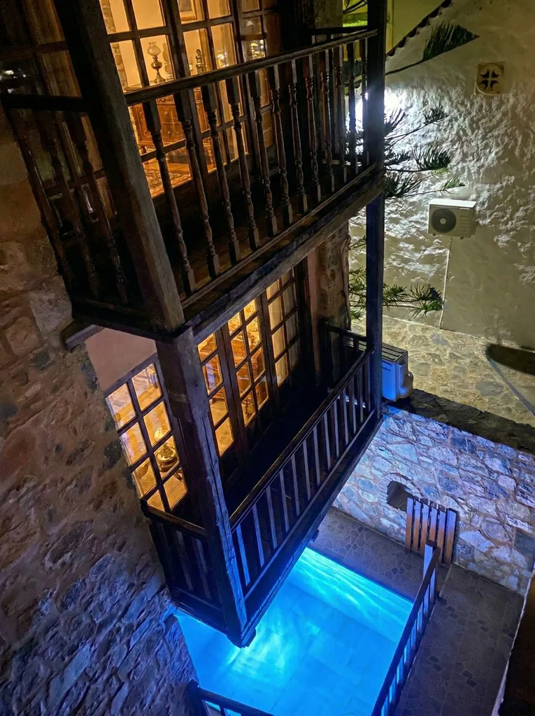 Monastiri courtyard pool night 01