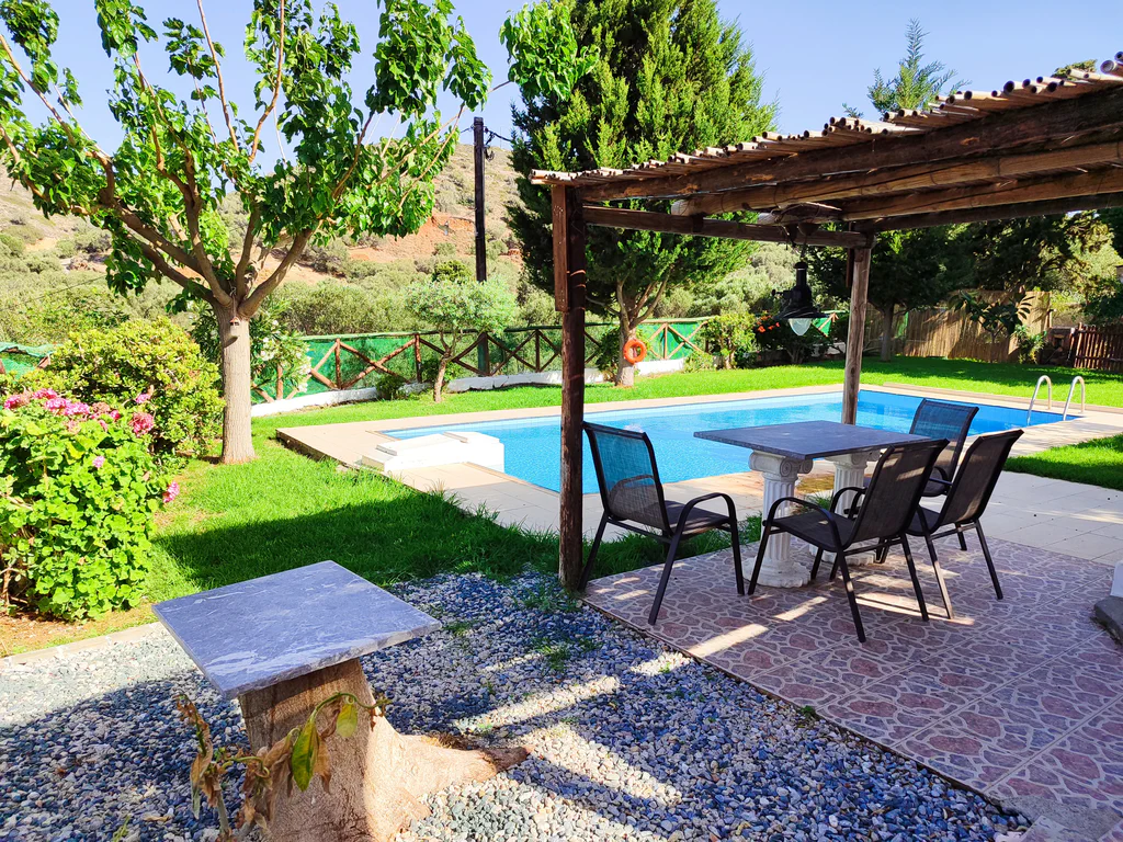Almond Tree Villa outdoor dining under reed shade